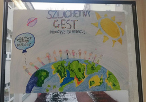 Plakat wykonany przez uczniów klasy 4 promujący akcję charytatywną na rzecz podopiecznych fundacji „Szlachetny Gest