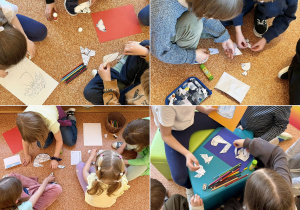 Uczniowie układają puzzle.